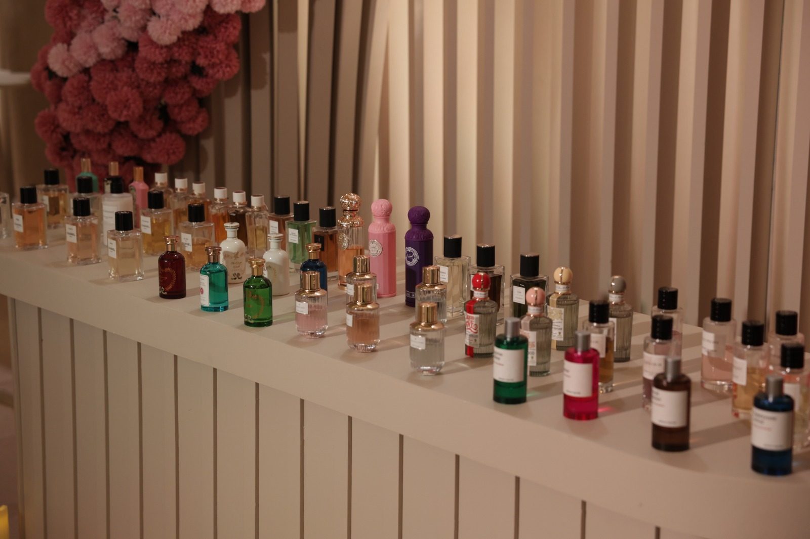 Favours bar lined with perfume bottles