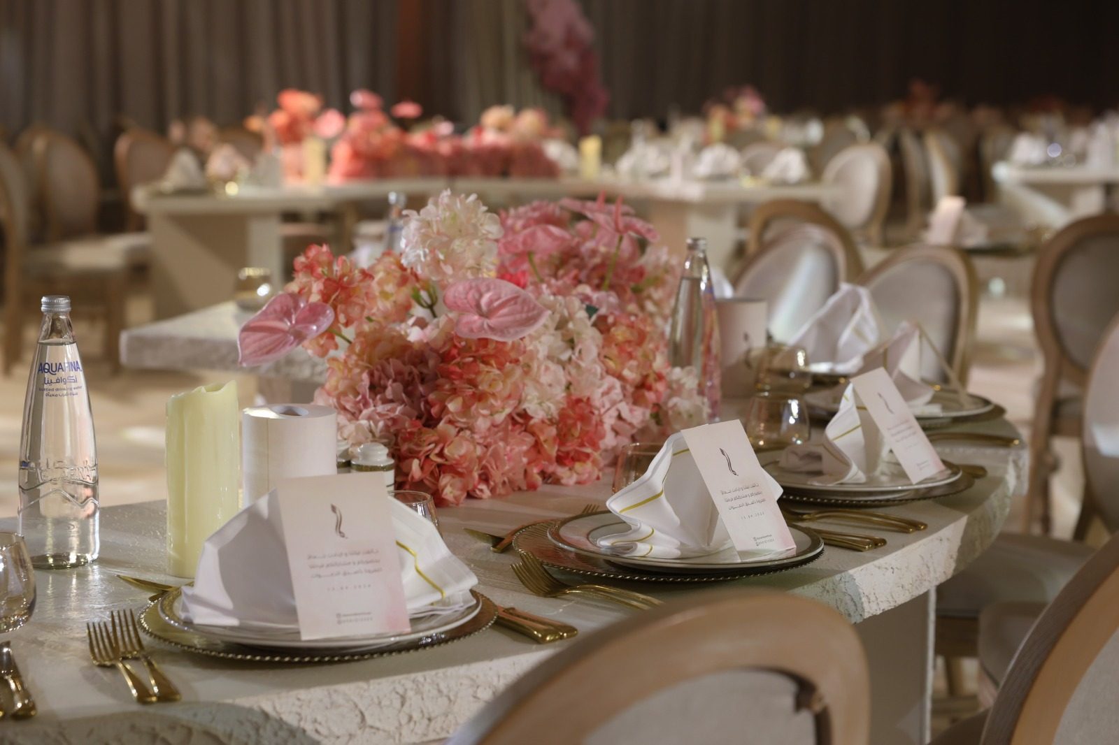 Wedding table with candles and roses