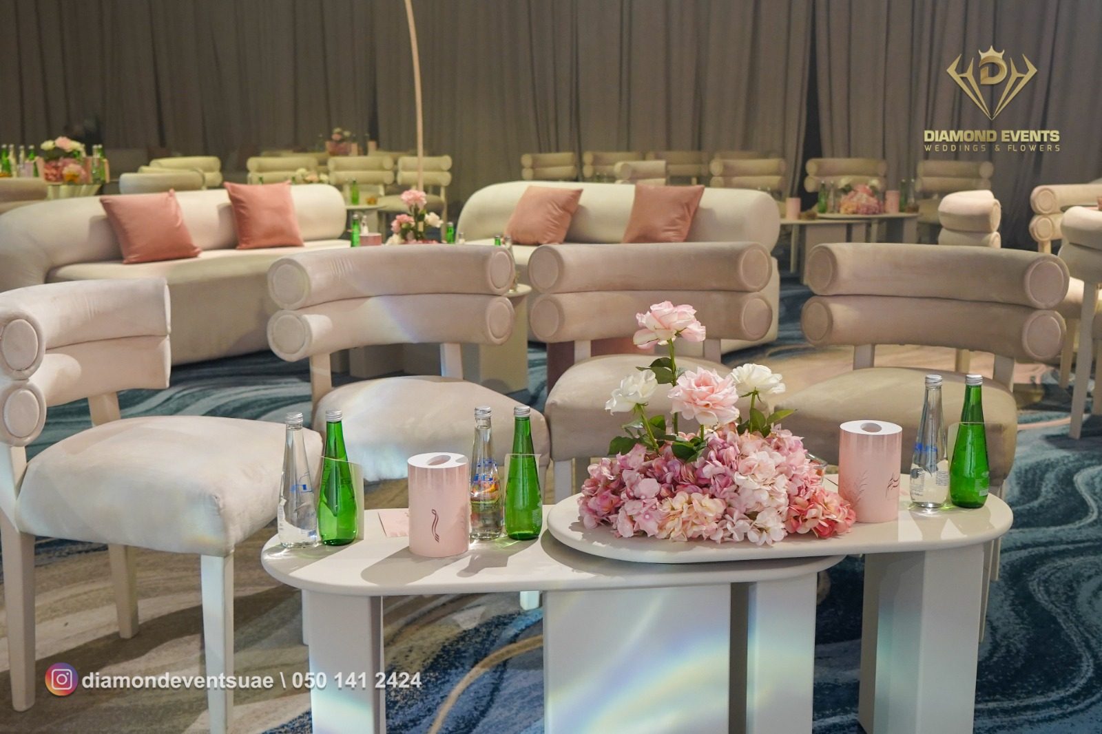 Velvet chairs around a styled table